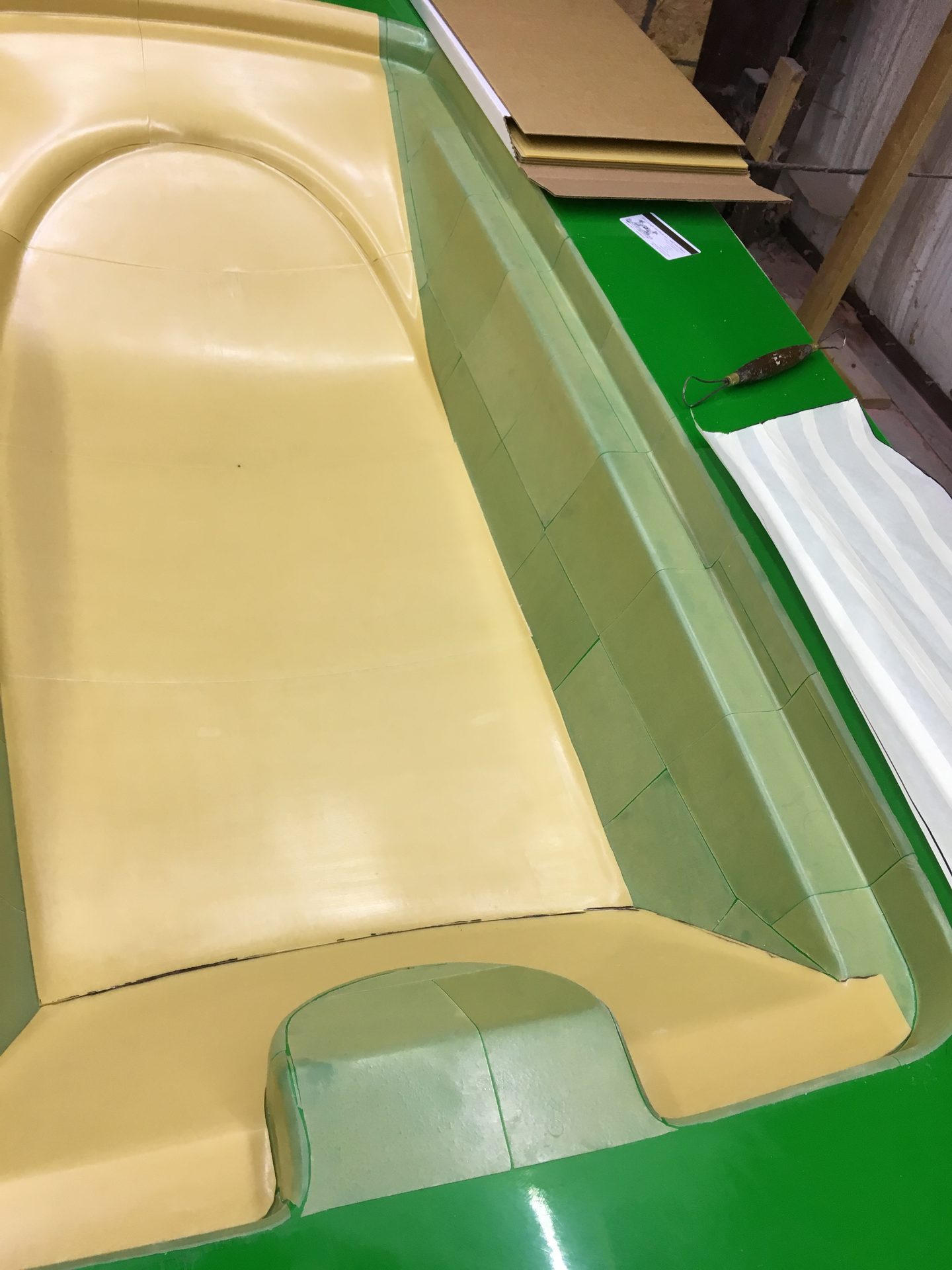 Tan boat deck mold in the shop