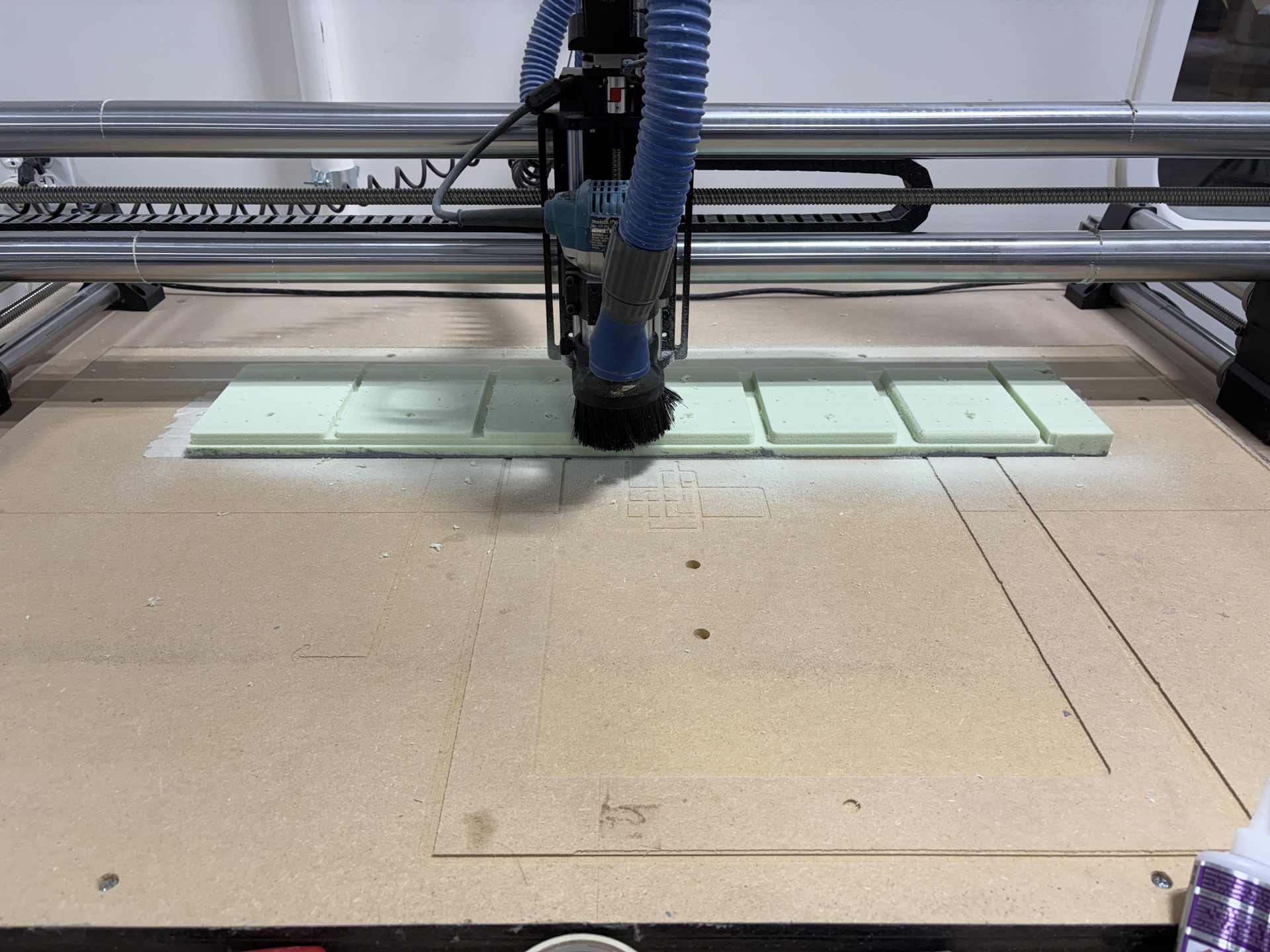 CNC router cutting a full-size tooling pattern at Pro-Glas