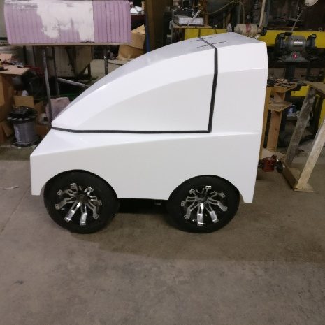 White rover prototype body in the shop
