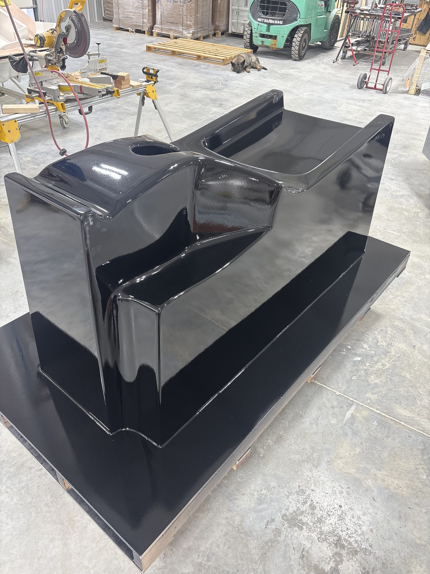 Glossy black fiberglass spa shell